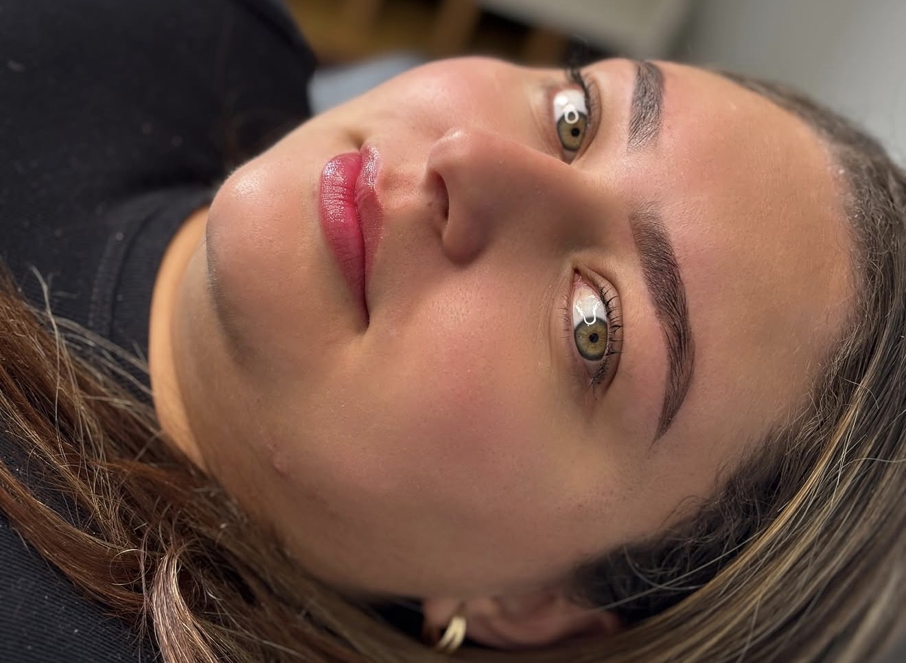 Close-up client portrait with delicate lashes